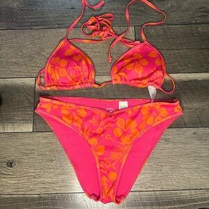 vibrant hot pink and orange flowered bikini, cross body tie top